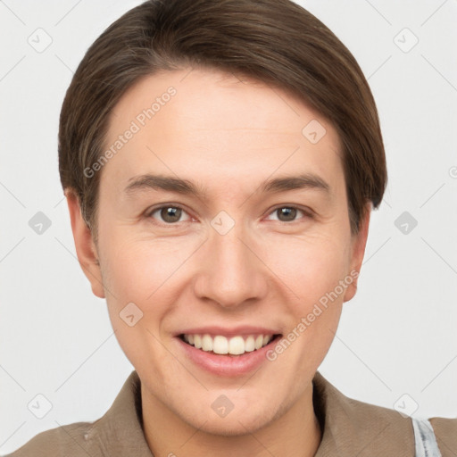 Joyful white young-adult female with short  brown hair and grey eyes