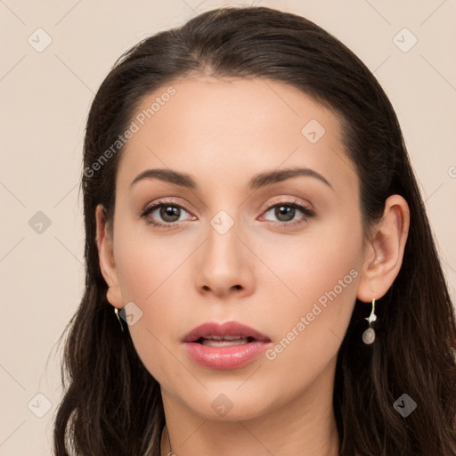 Neutral white young-adult female with long  brown hair and brown eyes