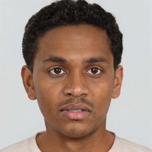 Neutral black young-adult male with short  brown hair and brown eyes