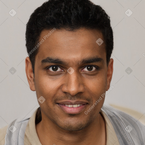 Joyful black young-adult male with short  black hair and brown eyes