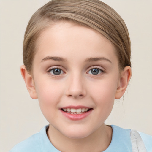 Joyful white child female with short  brown hair and grey eyes