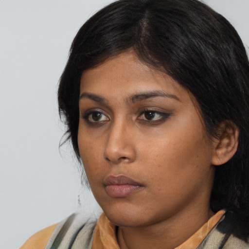 Neutral asian young-adult female with long  brown hair and brown eyes