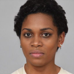 Neutral black young-adult female with short  black hair and brown eyes