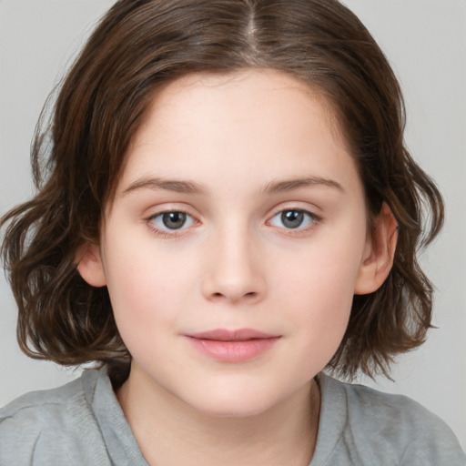 Joyful white child female with medium  brown hair and brown eyes