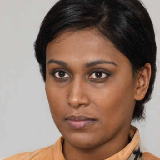 Neutral asian young-adult female with medium  brown hair and brown eyes