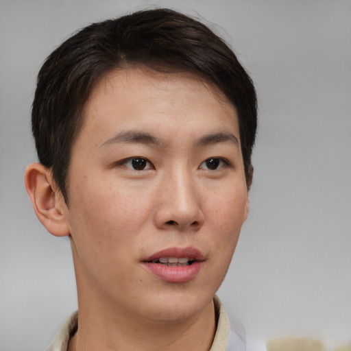 Neutral asian young-adult male with short  brown hair and brown eyes