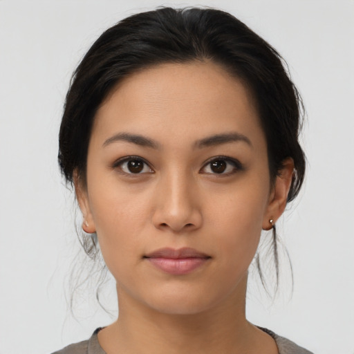 Neutral latino young-adult female with medium  brown hair and brown eyes