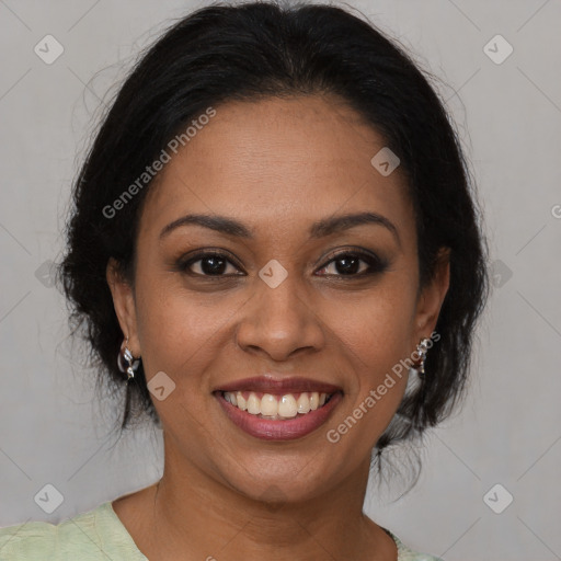 Joyful black young-adult female with medium  brown hair and brown eyes