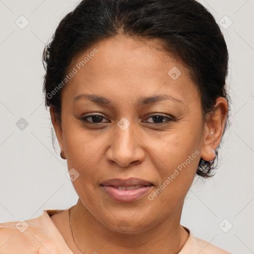 Joyful black adult female with medium  brown hair and brown eyes