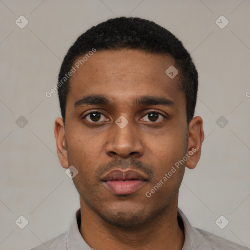 Neutral latino young-adult male with short  black hair and brown eyes
