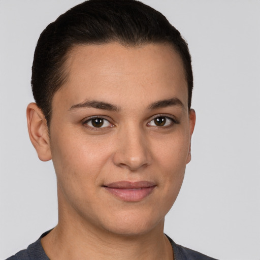 Joyful white young-adult female with short  brown hair and brown eyes