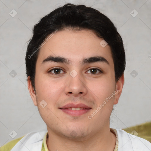 Joyful white young-adult male with short  black hair and brown eyes