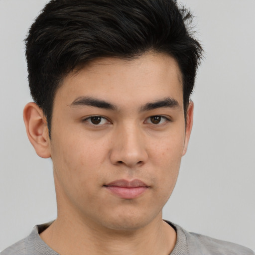 Neutral asian young-adult male with short  brown hair and brown eyes