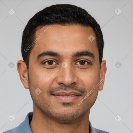 Joyful latino young-adult male with short  black hair and brown eyes