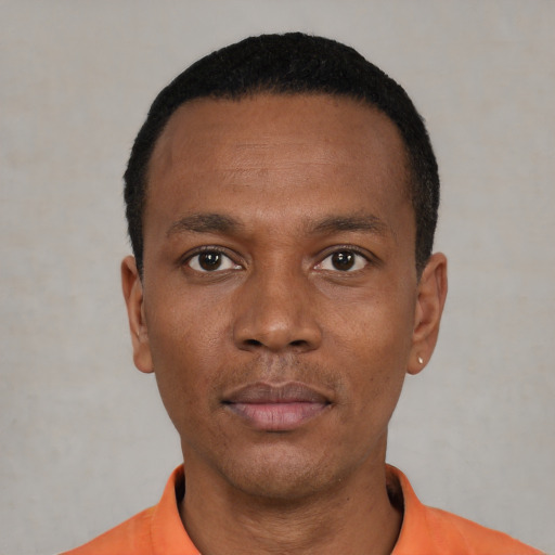 Neutral black young-adult male with short  black hair and brown eyes