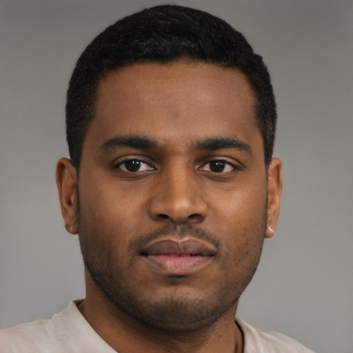 Neutral latino young-adult male with short  brown hair and brown eyes