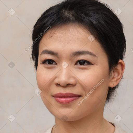 Joyful asian young-adult female with medium  brown hair and brown eyes