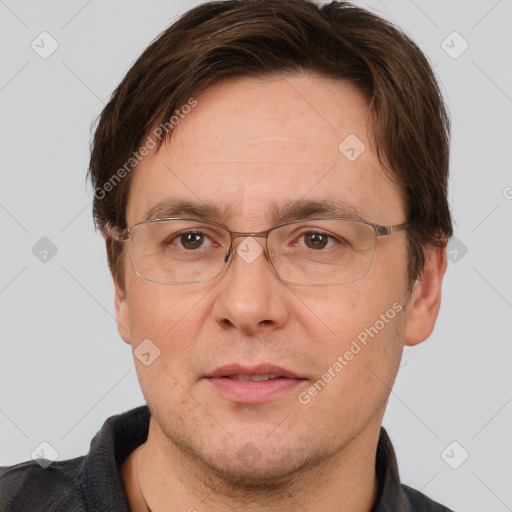 Joyful white adult male with short  brown hair and grey eyes