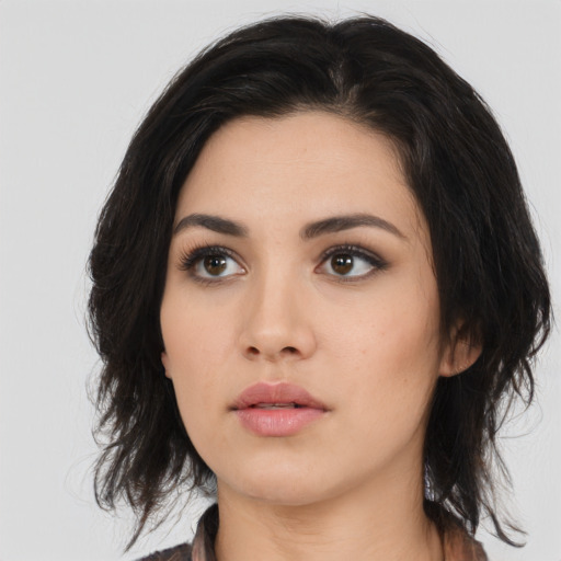 Neutral asian young-adult female with medium  brown hair and brown eyes