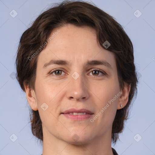 Joyful white adult female with medium  brown hair and brown eyes