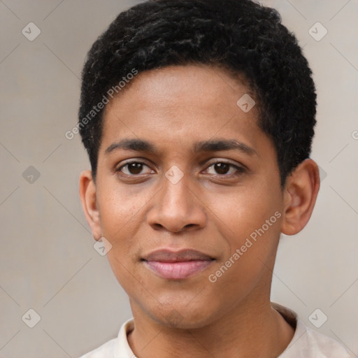 Joyful black young-adult male with short  black hair and brown eyes