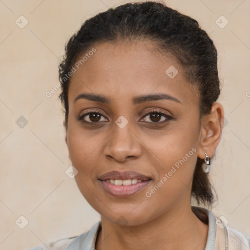 Joyful latino young-adult female with short  brown hair and brown eyes