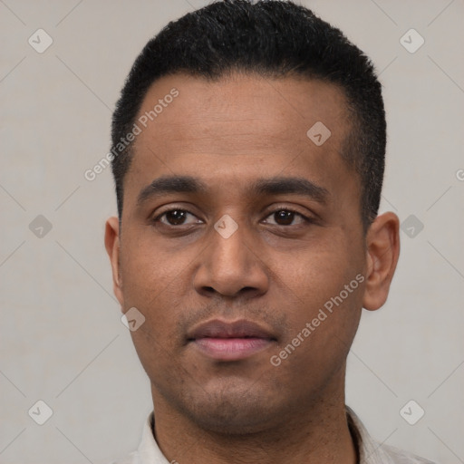 Neutral latino young-adult male with short  black hair and brown eyes
