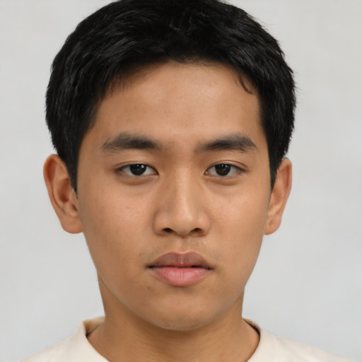 Neutral asian young-adult male with short  black hair and brown eyes