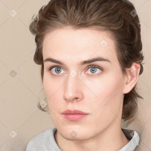 Neutral white young-adult female with medium  brown hair and green eyes