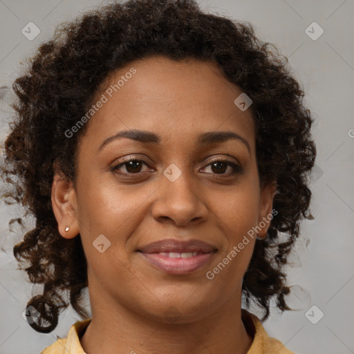 Joyful black young-adult female with medium  brown hair and brown eyes