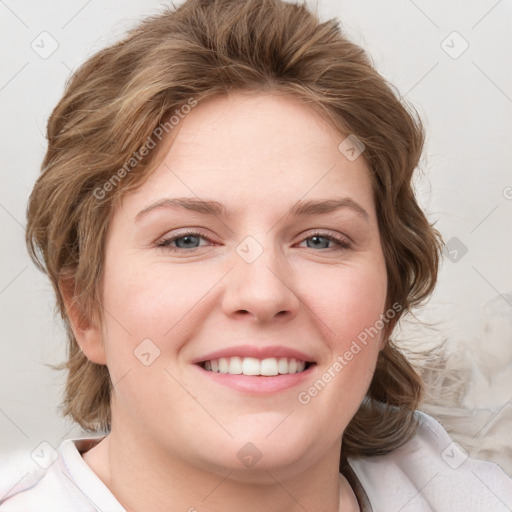 Joyful white young-adult female with medium  brown hair and blue eyes