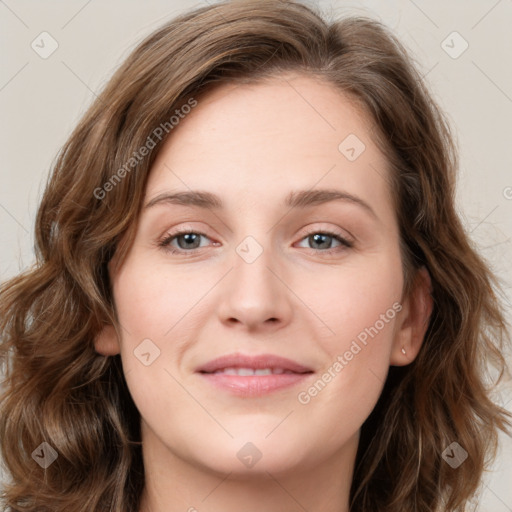 Joyful white young-adult female with long  brown hair and green eyes