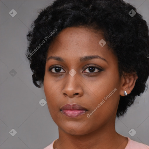 Neutral black young-adult female with short  black hair and brown eyes