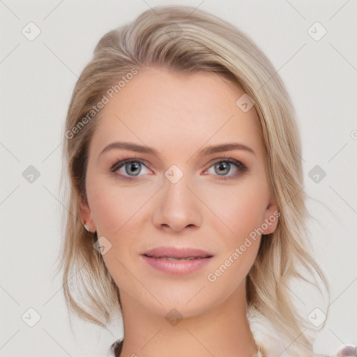 Joyful white young-adult female with medium  brown hair and blue eyes