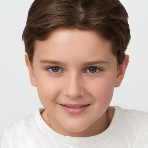 Joyful white child female with short  brown hair and brown eyes