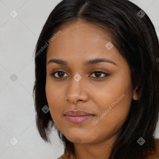 Joyful asian young-adult female with long  brown hair and brown eyes