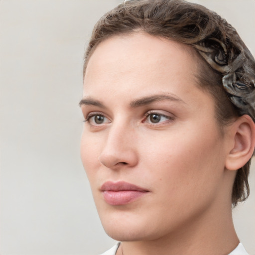 Neutral white young-adult female with medium  brown hair and brown eyes