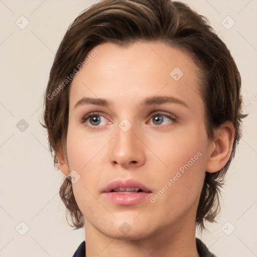 Neutral white young-adult female with medium  brown hair and brown eyes