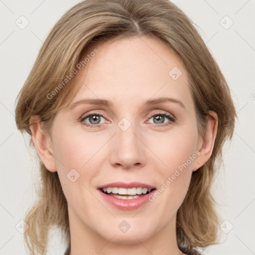 Joyful white young-adult female with medium  brown hair and blue eyes