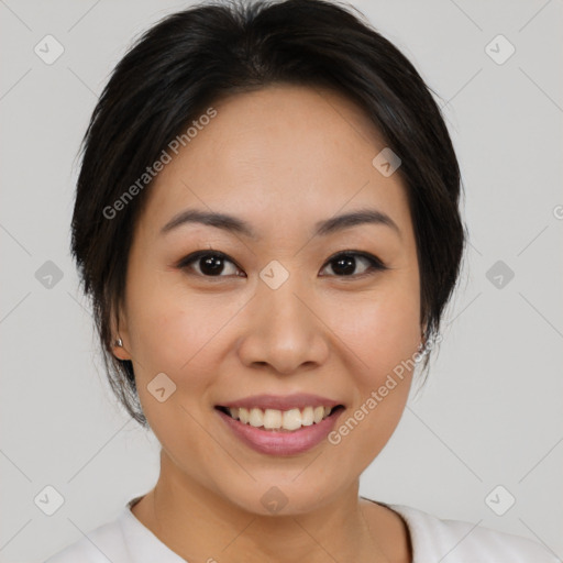 Joyful asian young-adult female with medium  brown hair and brown eyes