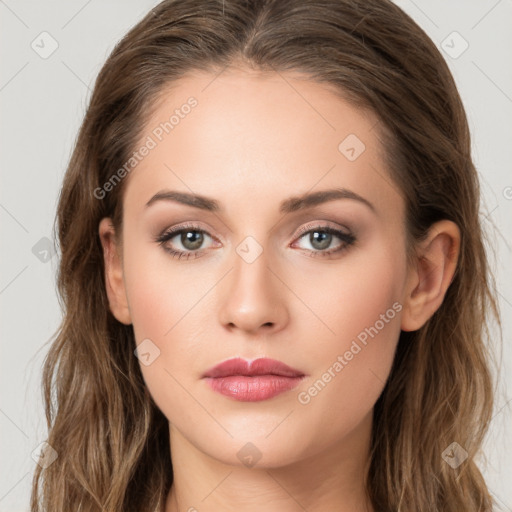 Neutral white young-adult female with long  brown hair and green eyes