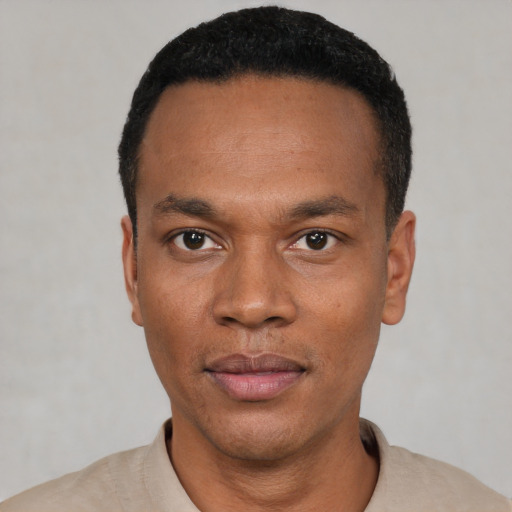 Neutral black young-adult male with short  black hair and brown eyes