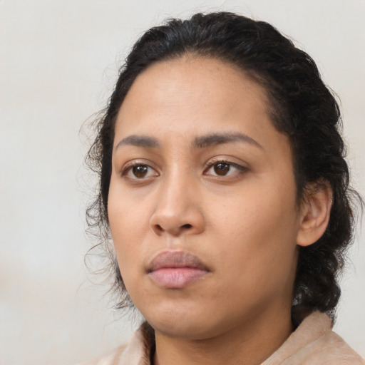 Neutral latino young-adult female with medium  black hair and brown eyes
