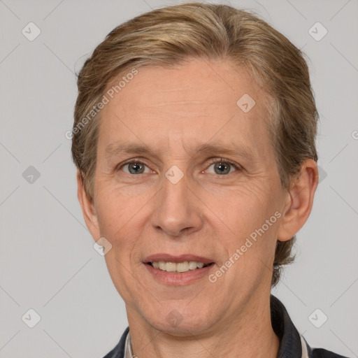 Joyful white middle-aged female with short  brown hair and brown eyes