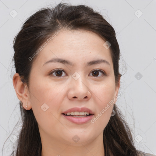 Joyful white adult female with long  brown hair and brown eyes