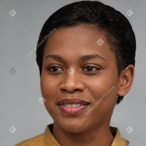 Joyful black young-adult female with short  brown hair and brown eyes