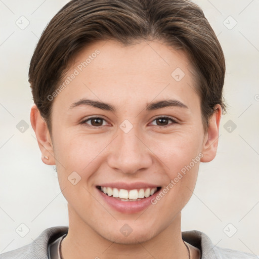 Joyful white young-adult female with short  brown hair and brown eyes