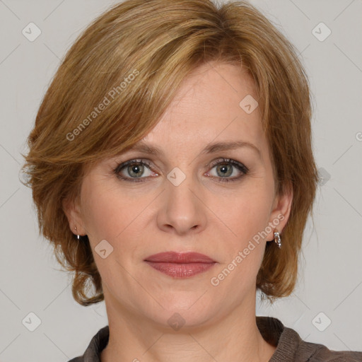 Joyful white young-adult female with medium  brown hair and green eyes