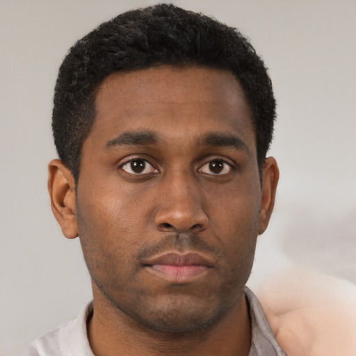 Neutral black young-adult male with short  brown hair and brown eyes