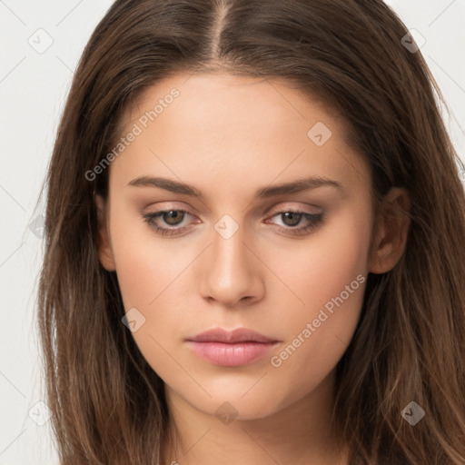 Neutral white young-adult female with long  brown hair and brown eyes